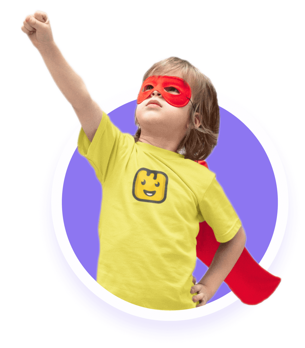 Kid posing like superman wearing red mask and Givebutter T-shirt