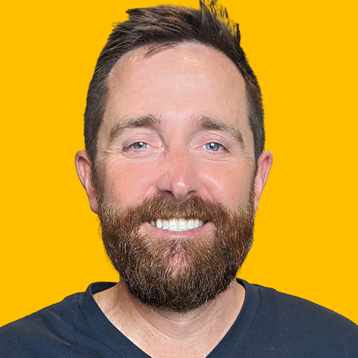 Rodney's headshot against a yellow background